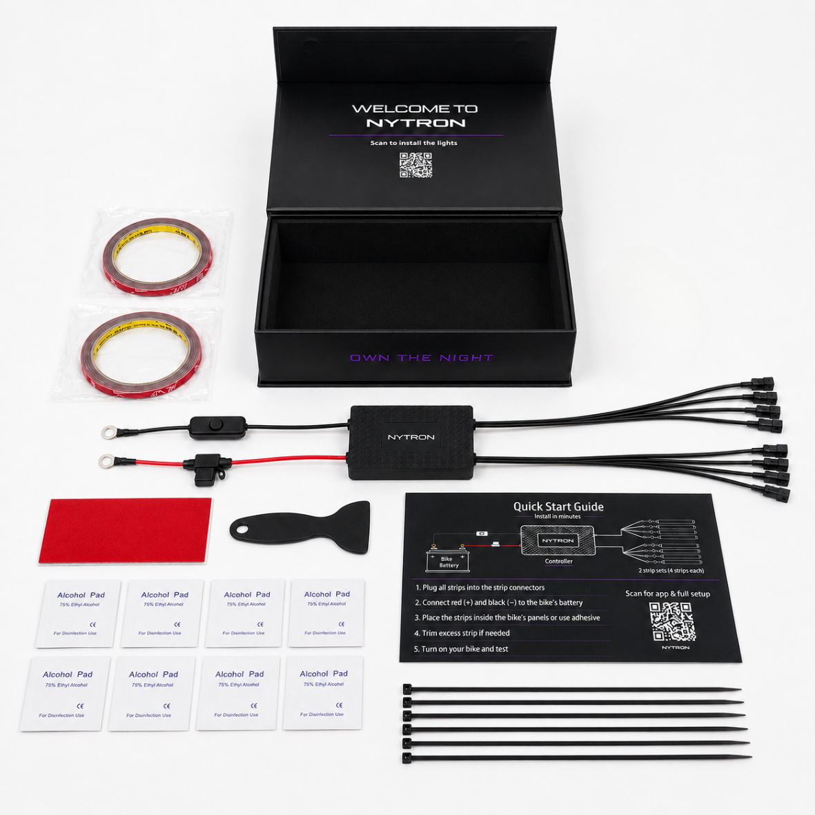 Flat lay of the NYTRON kit: box, controller with switch and fuse, strip cables, mounting tape and quick start guide.